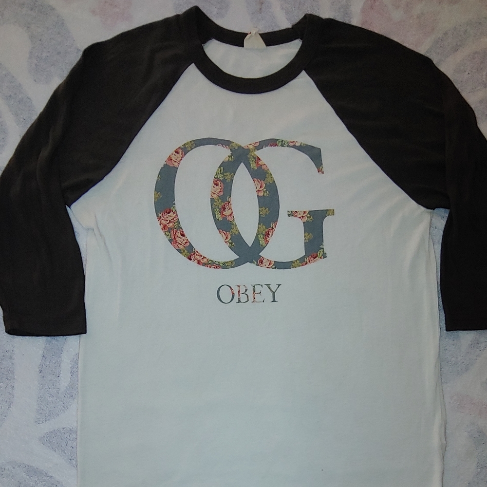 OBEY with floral design.  3/4 Jersey Sleeve MEDIUM